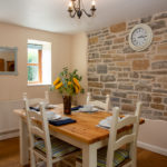 Barn Cottage Dining Room with table laid